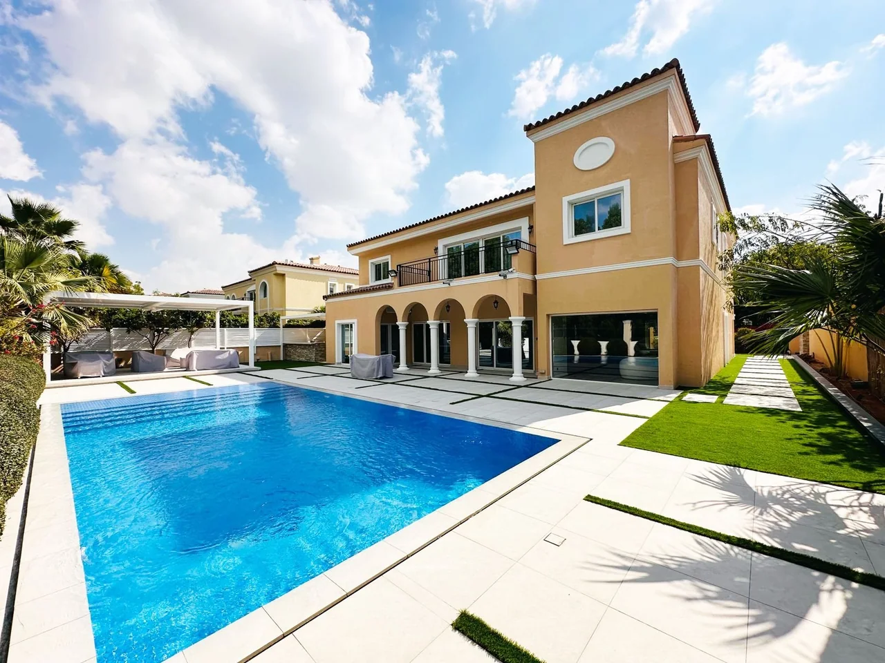 Villa swimming pool with landscaped surroundings